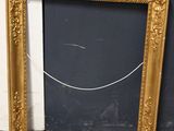 a picture of a chalk board with a gold frame
