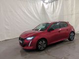 la photo d'une voiture rouge garée dans un garage