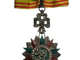 une image représentant une médaille ornée d'un ruban et d'une étoile