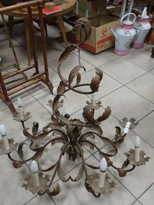 a chandelier that is sitting on the floor in the room