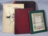 several books are sitting on a table with a cup of coffee