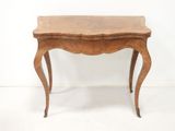 an image of a small wooden table with a drawer underneath it