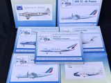 six boîtes de cartes Air France posées sur une surface noire