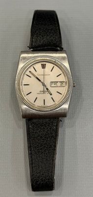 an image of a wrist watch with a white dial and black leather strap