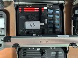 a lot of tools in a case on the floor