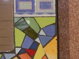 a picture of a mirror that has a colorful design on it