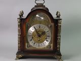 a clock that is sitting on top of a table