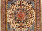 an oriental rug with a medallion design on a blue ground