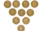 six types de pièces différents disposés en forme de cœur