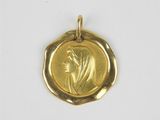 an image of a gold coin with a woman on it