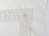 an image of a white pillow with a cross on it