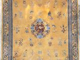 an oriental rug with a medallion design on a yellow ground