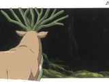 a picture of a picture of a deer with a plant on its head