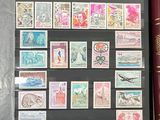 a picture of a collection of stamps and a book