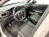 the interior of a car with a steering wheel, dashboard, and dash board