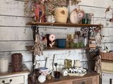 a kitchen with a lot of items on the shelves
