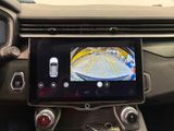 the dashboard of a car with a camera mounted to it ' s dashboard