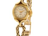 an image of a woman ' s wrist watch with a chain around it