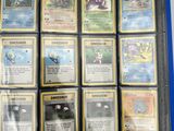 a lot of pokemon cards in a blue folder