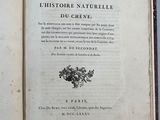 un livre ouvert avec l'image d'un oiseau dessus