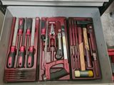 a drawer full of tools that are sitting in a drawer