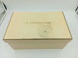 a box that is sitting on a table with a picture on it