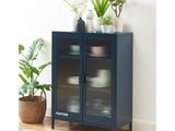 a close up of a cabinet with plants on top of it