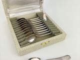 a box with a set of spoons and spoons in it