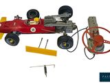 a model of a race car with a steering and a steering wheel