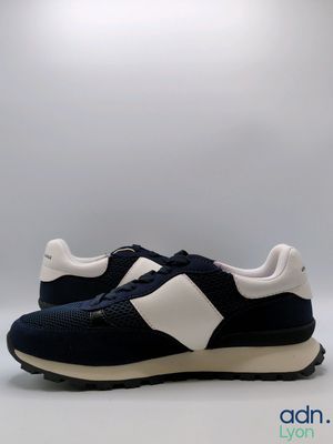 a close up of a pair of sneakers on a white background