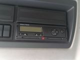 a radio in the center of a car ' s dashboard