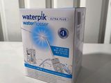 a box of waterpik ultra plus water flosser