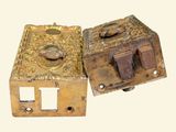 two different types of antique brass locks on a white background