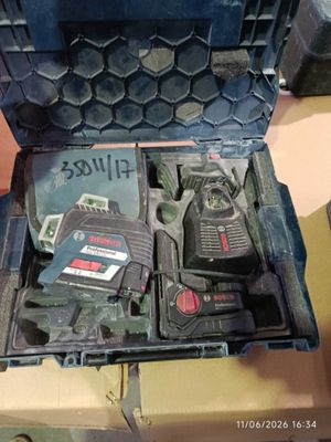 a tool box with tools inside of it on a table