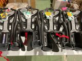 a lot of baby strollers that are on the table