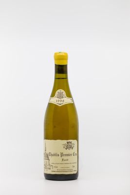 la bouteille de vin est posée sur une surface blanche