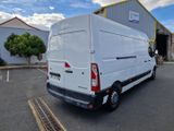 a white van that is parked in a parking lot