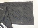 two pieces of clothing that are laying on the floor