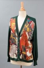 an image of a woman ' s cardigan sweater on a mannequin
