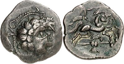 a close up of a coin with a horse on it