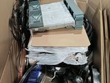 a cardboard box with a bunch of electronics inside of it