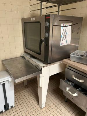 an image of a commercial kitchen with a microwave