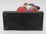 a black box with a colorful ball inside of it
