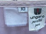 a close up of a white shirt with a label on it
