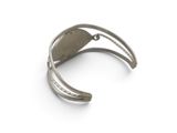 an image of a silver bracelet with a curved design on it