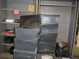 a lot of boxes stacked on top of each other in a room