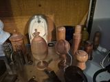 many different types of vases on the table
