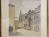 framed watercolor painting of a street scene with buildings and a clock tower