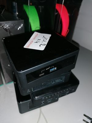 an image of a computer on a desk with a sticker on it