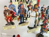 many figurines of different military men on display